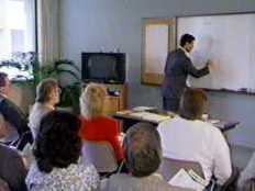 Trainer in classroom.